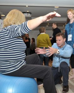Tom Lowes assisting Clive Lathey at the iO Conference.